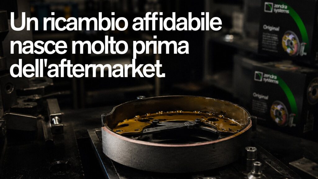 Tamburo freno in lavorazione su attrezzatura di officina con packaging Zendra Systems Original sullo sfondo
